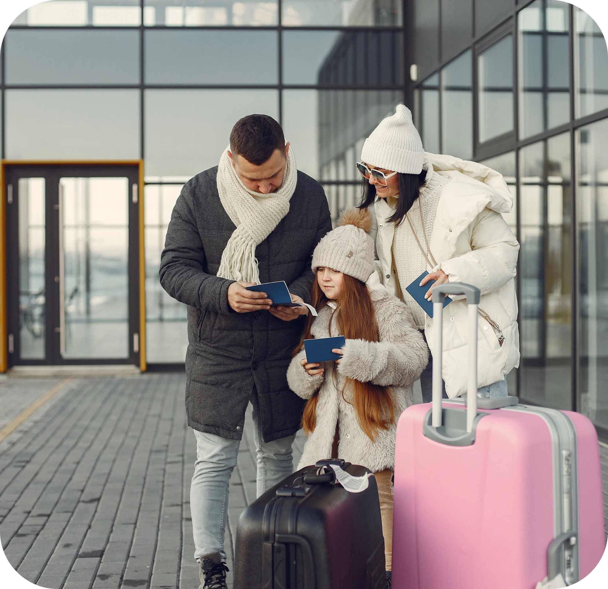 Family with luggage and car seat at JFK Terminal 4